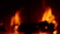 Blurred out fire in fireplace in SLOW MOTION HD VIDEO. Defocused burning flames filling frame of screen.