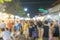 Blurred people background shopping at market fair blur background with bokeh