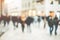 Blurred people walking in the street with back sun light - Defocused image - Rush hour and metropolis concept