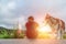 Blurred photos of people and dogs, which are very honest pets. Soft focus on a young man and his companion Siberian dog sitting by