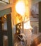 Blurred picture of melting furnace tap molten metal into ladle