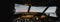 blurred professionals piloting airplane in evening