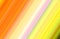 Blurred purple yellow orange light diagonal stripes  computer generated picture background.