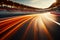 Blurred racing track with twisting traffic, dynamic bokeh background