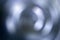 Blurred radial gradient blue gray background. Mixed circular texture