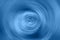 Blurred radial gradient classic blue background. Mixed circular texture