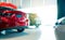 Blurred rear view of red car. Luxury car parked in modern showroom. Car dealership office. Automobile retail shop. Electric and