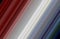 Blurred red black white grey blue colourful light diagonal stripes  computer generated picture background.