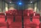 Blurred Red movie seat rows in small private theater hall room background