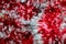 Blurred red shiny christmas tinsel texture for decoration