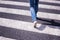 Blurred road crossing with pedestrian feet