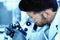 Blurred scient background of scientist reseacher using microscope in laboratory