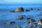 Blurred sea waves on a shingle beach