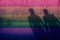 Blurred Shadow Shape of male lover on Rainbow light Background,