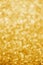 Blurred shiny Christmas festive background in trending color Fortuna Gold.