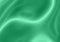 Blurred shiny dark green metal plate texture background. Defocused emerald art abstract metallic gradient backdrop