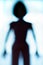 Blurred silhouette of human body look like alien