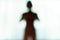 Blurred silhouette of human body look like alien