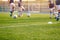 Blurred Soccer Field at School. Young Soccer Players Training on Pitch