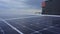 Blurred solar panels on the roof. Close-up frontal view of a photovoltaic panel