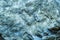 Blurred with strong magnification, the background with a fine texture of blue rock
