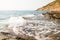 Blurred strong wave against the rocks at Khao Laem Ya National park, Rayong province, Thailand