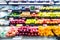 Blurred supermarket aisle shelves chilled fruit zone