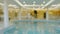 Blurred Swimming in spa pool with hot water in spa and wellness resort. Vercion 2