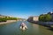 Blurred tourist boat over Seine river in Paris