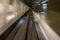 Blurred train track in a tunnel