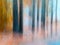 Blurred Tree Trunks At A City Park With Golden Autumn Leaves. Intentional Camera Movement ICM. Fall Fine Art Design.
