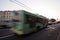 A blurred trolleybus on the street