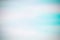 Blurred turquoise background with vignetting