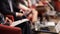 Blurred unrecognizable participants at round table, political meeting, business event or conference