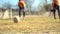 Blurred video. Slow motion. Legs of young soccer players during the game in training