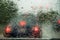 Blurred view of cars in traffic through car windshield covered i