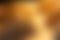 Blurred warm autumn background. Yellow, orange, brown gradient colors