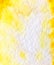 Blurred watercolor yellow and white background with paper texture