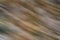 Blurred wood background oblique lines dark brown