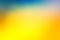 Blurred yellow blue and orange background, soft blurry gold color, colorful vibrant background design, shiny bold background