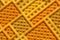 Blurred yellow texture of different sizes diagonal rectangles