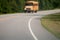 Blurry abstract view of school bus driving on road