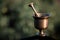 Blurry background. Early 18th Century Bell Metal Mortar And Pestle