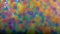 Blurry background. Multicolored transparent balls, spheres of rainbow colors made of water gel. Background. Copy Space