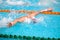 Blurry background of splash drop water on swimming race