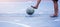 Blurry ball after futsal players shoot it. Futsal players barefoot