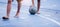 Blurry ball after futsal players shoot it. Futsal players barefoot