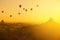 blurry beautiful sunset and hot air balloon over ancient pagoda in Myanmar