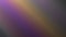 Blurry dark background with multicolored rays.