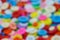 Blurry image of colorful sewing buttons clasper